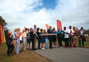 Titusville dignitaries cut the ribbon at the Blazing Trails Trail Dedication ceremony on February 23, 2018 in Titusville, Florida.