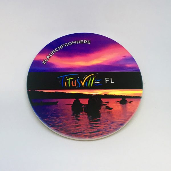 Launch From Here coaster featuring kayaking at sunset